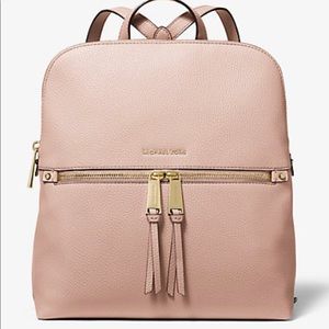 Michael kors Rhea Medium Pebbled Slim Backpack pink